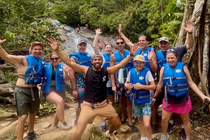 2 Tours in 1 Day: Rainforest Waterslides & Beach Tour w/Transport - El Yunque: wet rocks and two natural slides