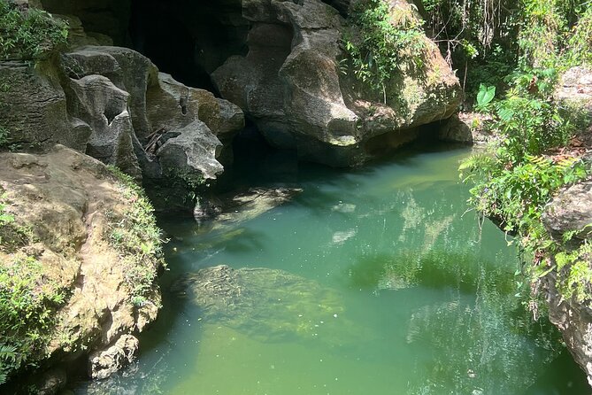 Cave Adventure: Canyon and Hidden Waterfall in Charco Azul - Swimming Through Three Cave Areas