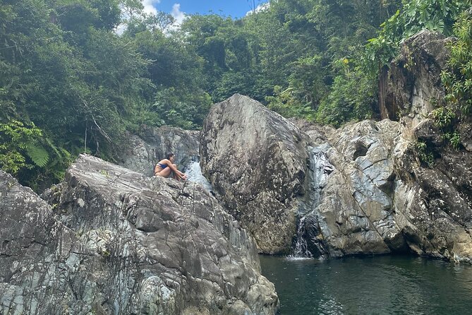 El Yunque Hike Adventure to Las Tinajas Waterfall from Fajardo - Walking through El Yunque’s wet forest