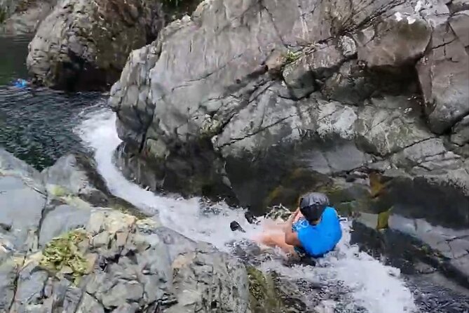 El Yunque Rainforest - Waterslide, Cliff jump, and Rope swing! - The local food stop after the water