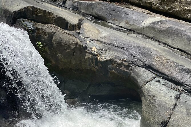 El Yunque Rainforest, Waterslides & Beach Tour from San Juan - The waterfall pool and natural waterslides