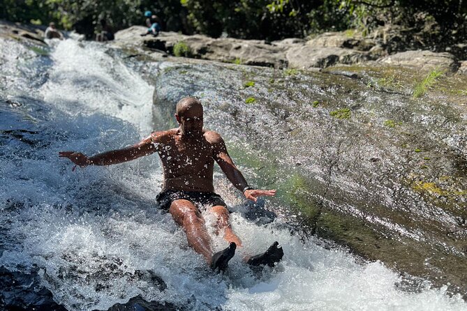 El Yunque Waterslide and Waterfall Tour with Food and Photos - From San Juan to a quieter corner of El Yunque