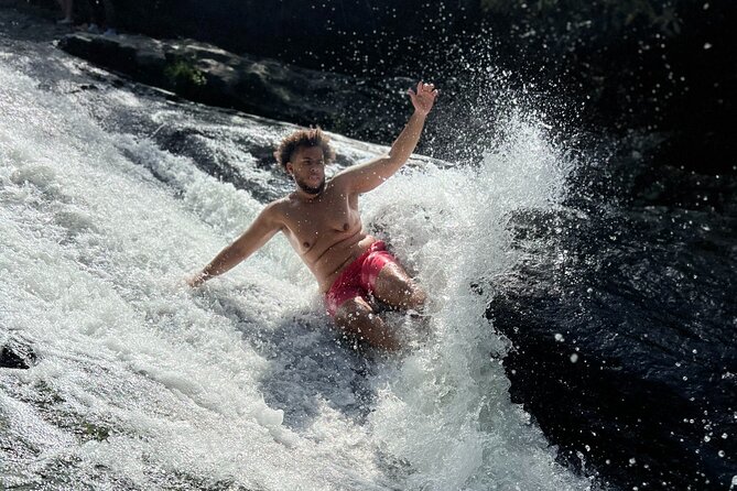 El Yunque Waterslide and Waterfall Tour with Food and Photos - Luquillo Beach brings a slower second act