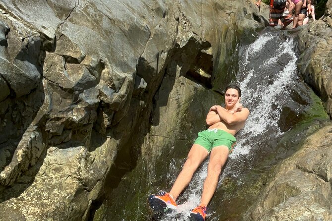 Explore El Yunque: Hiking, Swings & Waterslide (Small Group) - First pool: swimming, rope swing, and cliff jumps