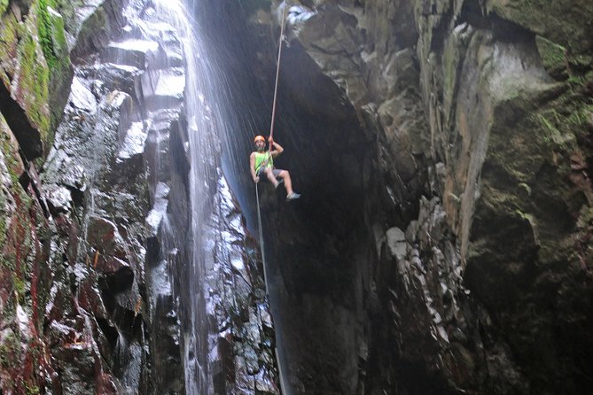 Full-Day Zipline and Waterfall Rappelling Adventure Near San Juan - Harnesses, helmets, and the first uphill push