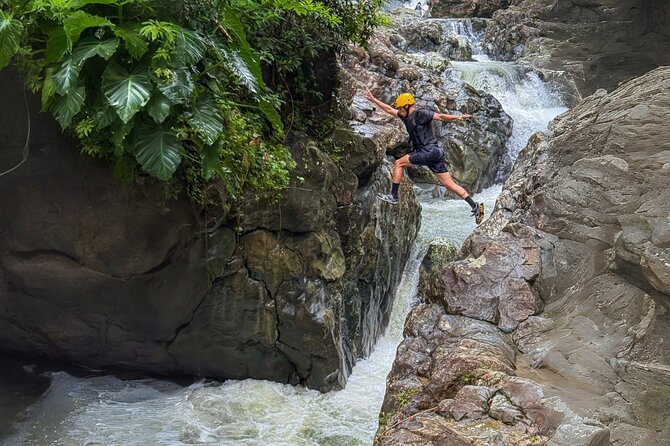 Half Day El Yunque Tour, Waterslide and Rope Swing - The second stop: natural rock slide and cliff jumps