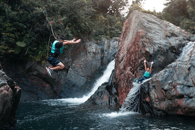 Half-Day Tour: El Yunque Rainforest and Waterslide Adventure - Mud, safety gear, and guide support