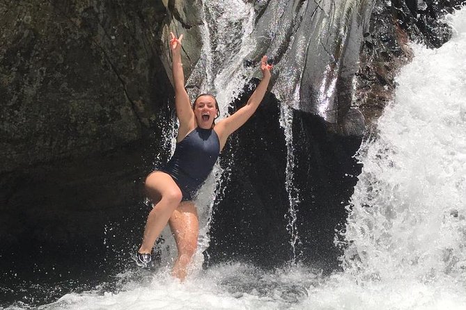Half-Day Yunque Rainforest Waterslide & rope swing Guided Tour - The second pool: natural rock slide and cliff jump