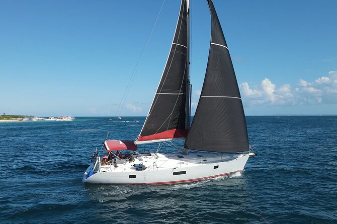 Private Half-Day Sailing and Snorkeling Tour - Swimming and Snorkeling in Clear Blue Water