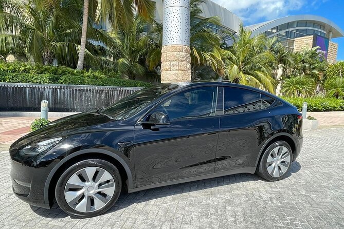 Puerto Rico Island Wide Transfer, Tesla Y Luxury SUV, Select Zone - Child Seats, Service Animals, and Group Comfort