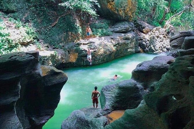 Rainforest Caves and Waterfalls Exploration with Transportation - Cliff jumping, petroglyphs, and optional thrills
