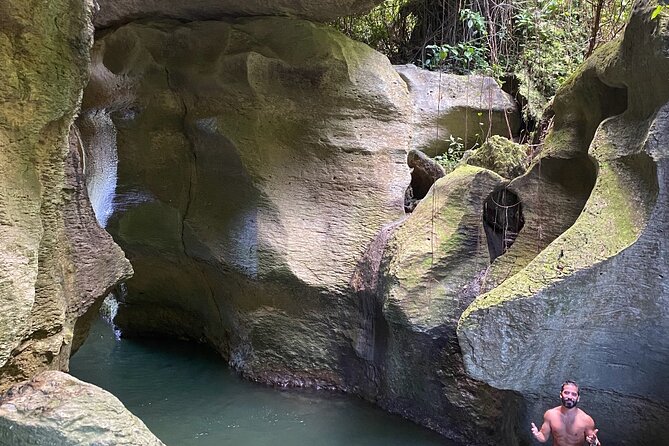 Rainforest Caves and Waterfalls Exploration with Transportation - Limestone caves, headlamps, and real scrambling