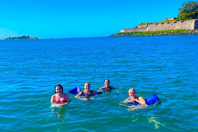 San Juan Bay Private Tour with Drinks and Tapas: 4+ people - Coastal life with Old San Juan in the distance