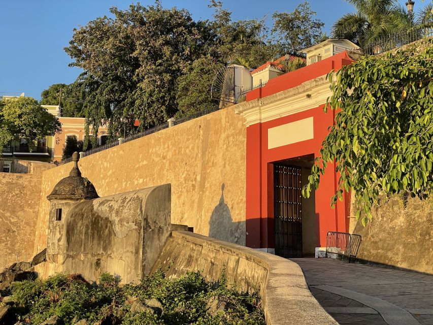 San Juan: Old Town Sunset Walking Tour - Moving through Plaza de la Barandilla and Plaza de Armas