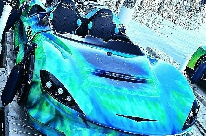 San Juan PR Watersports Car Rental Green McLaren - Leaving the marina and crossing San Juan Bay
