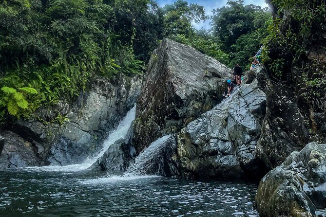 Small Group El Yunque Half Day Tour with Transport: Waterslide - Natural waterslides, cliff jumps, and a rope swing
