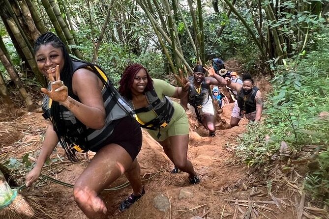 Small-Group El Yunque Rainforest & Transportation Luquillo Beach - Swimming, natural slides, jumps, and the rope swing