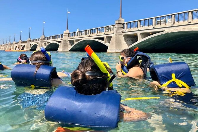 Snorkeling Guided Tour Experience in Condado Lagoon - Following the guide through the lagoon