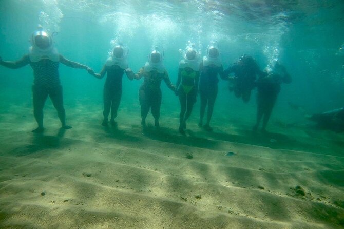 Underwater Sea Trek in San Juan: Explore Beneath the Waves - Wading into the protected cove