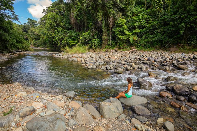 Yunque Rainforest River Rope Swing with Waterslide and Beach Tour - Luquillo’s volcanic rocks and natural pool