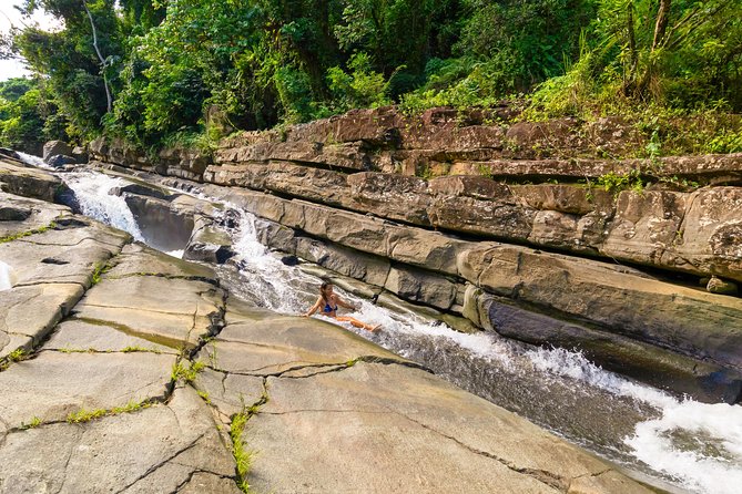 Yunque Rainforest River Rope Swing with Waterslide and Beach Tour - The rope swing and waterslide: fun with a natural edge