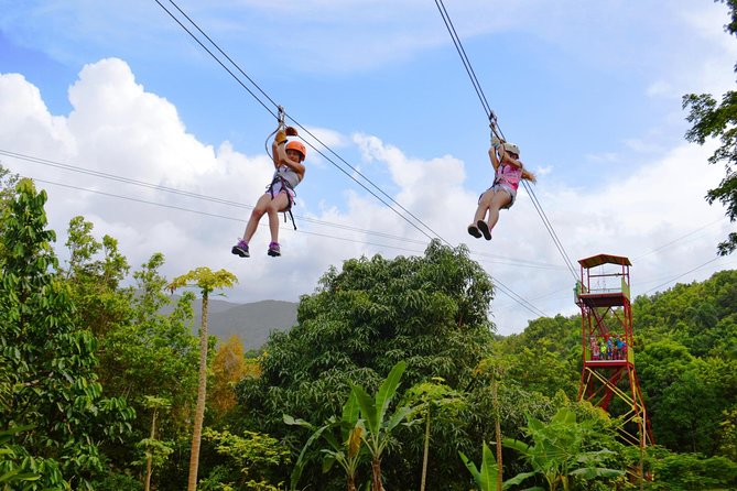 Zipline Canopy Tour with Transport from San Juan - Getting Fitted for the Canopy Course
